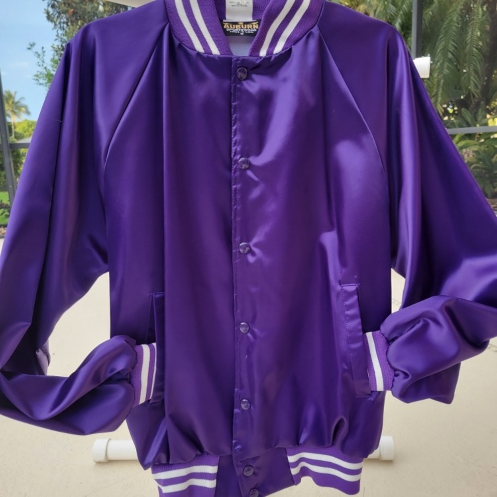 Shiny Purple bomber snap up style jacket with white unicorn on back